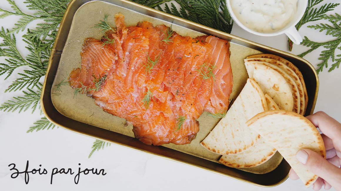 Salmon gravlax with steak spices and pickle sauce from Trois fois par jour