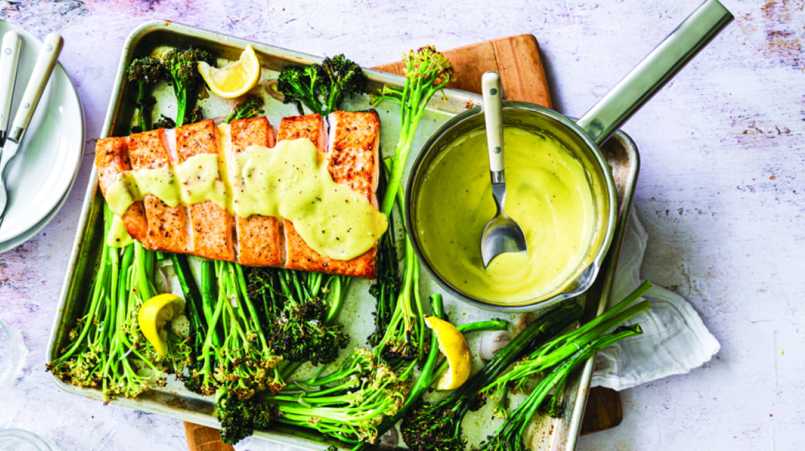 Roast baby broccoli, cauliflower and salmon with hollandaise sauce